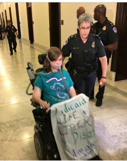 anfem-cripplepunk: spooniecatlover:  spooniecatlover:  Part 1.   National RESIST protest of ~50 disabled protesters. 43 were arrested.  Part 2   Part 3Of Photos and Tweets from the ADAPT protest at Mitch McConnell’s office.For excellent video coverage