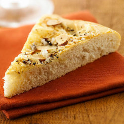 bhgfood:  Swiss Cheese-Almond Flatbread: This loaf is full of salty, cheesy flavors! 