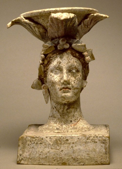 Ancient Greek terracotta incense burner in the form of a female head, possibly Kore/Persephone.  Art