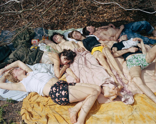 artvevo: Swedish native Sophie Mörner and her friends took a day-trip to a park, setting up camp in the woods. Mörner captured the above photo early in the morning, her sleepers made up of friends, acquaintances and a few strangers all basking in