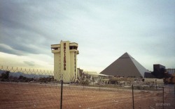 vintagelasvegas:  Remains of the Hacienda. Las Vegas, 1/1/97.  The Hacienda Hotel-Casino in the morning hours after the room towers were imploded and reduced to rubble. Photo by Chris Flanders   The elevator shaft was a little stronger than they thought.