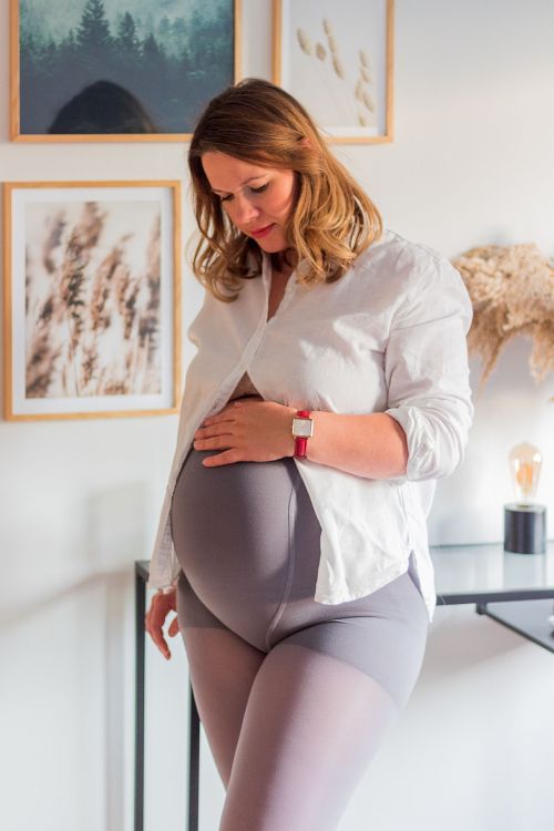 Becoming moms wearing pregnancy tights.