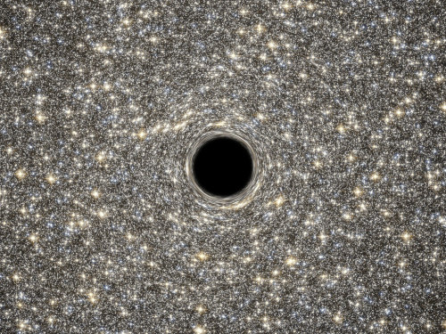 coffeenuts: Hubble Helps Find Smallest Known Galaxy Containing a Supermassive Black Hole by NASA God