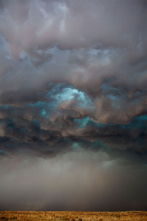 writinginslowmotion: awhisperinthenight: requiem-on-water: storm clouds above the American Midwest b