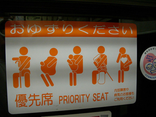 Funny sign on train by westius on Flickr.