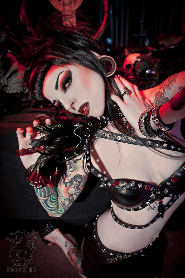 ilovegothgirls:  Fun with feathers and studs 