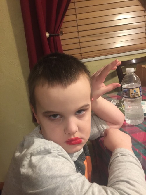 My little brother let me do his makeup and he looks like a fierce bitch