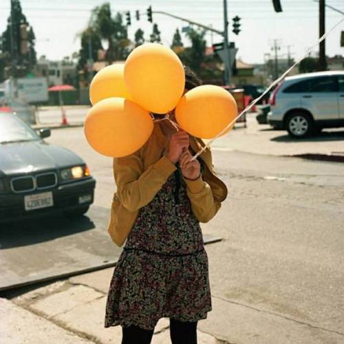 Ana Cuba #photography #portrait #orange #balloon #person #people #hidden #design #photo #pic #pictur