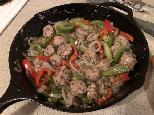 Italian sausage, peppers, and onions! I ended up letting it simmer in the wine for longer after this