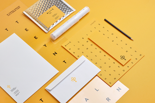 Noeeko Sophisticated identity system with a playful typographic treatment!