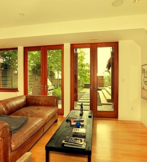 Family Room Game Room In VancouverLarge Enclosed Light Wood Floor Game Room Photo With White Walls, No