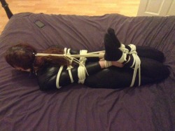 wyredslave:  pinkstarsfallinginreverse:  Equipment and ropework: thattroikidd  After her enforced Bieber appreciation session Lucy was put into a Hogtie. So she could contemplate her position, the meaning of the collar locked around her throat and her