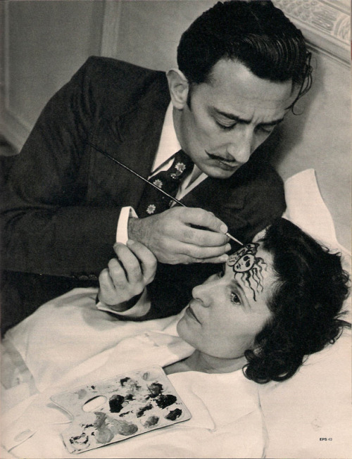 Salvador Dali painting wife Gala’s forehead, 1948