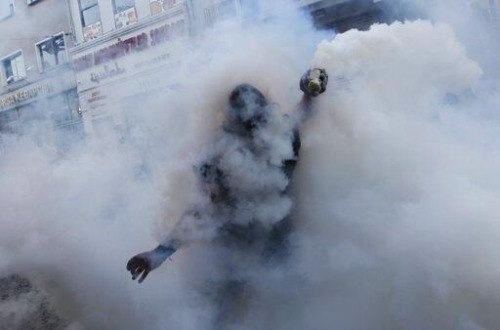 Tear gas bombs thrown by police at Turkish rebels.