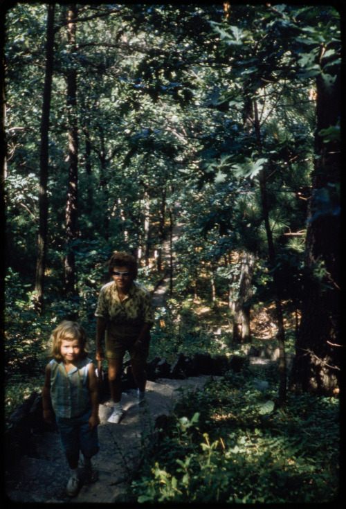 suzy and liz climbing up to wisconsin dells lookout tower. august 1962