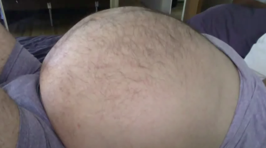 bigroundmpregbellies:  He laid in bed wondering if, after 40 weeks and 3 days, this