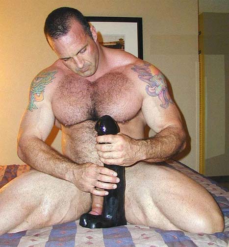 Porn photo Chris Duffy rides an ass-wrecking dildo.