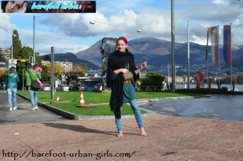Second issue (PHOTOSET   VIDEO) of a brand-new special feature at BAREFOOT URBAN GIRLS! Subscribers have the chance to enjoy the gorgeous 24/7/365 barefoot beauty RED-X in her new hometown Lugano (Switzerland), where she is now working (barefooted,