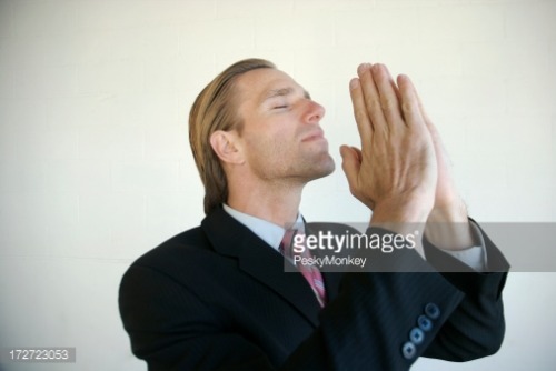Praying Businessman - PeskyMonkey.
