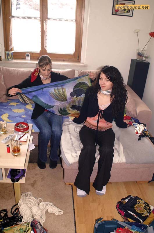 graybandanna:  Tying up her friend before joining her in scarf bondage