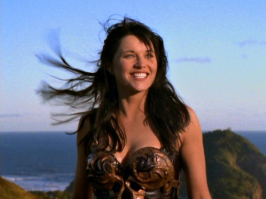 dadrielle:lightsaroundyourvanity: haelstorm:  lightsaroundyourvanity:  haelstorm:  haelstorm:  my sexuality is that shot in the opening of xena: warrior princess of lucy lawless turning toward the light with wind flowing through her hair, looking more