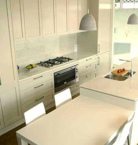 Enclosed KitchenA Mid-sized, Modern Galley Kitchen Design Example With A Concrete Floor, Shaker Cabinets,