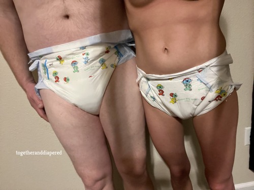 Matching diapers!  We had some fun in these if you know what I mean!  Also, you tell which one of us