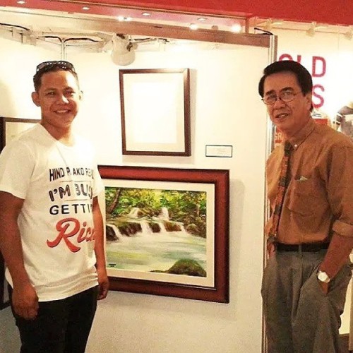 Dropped by the “Art to Art”, a painting and poetry exhibit organized by the Arts Council of Cebu held at Ayala Center Cebu. With me is Mr. Dante Luzon and his ‘oil on canvass’ artwork entitled “Hagimit Falls”.
Photo by Mr. Dante and Mrs. Norie Luzon