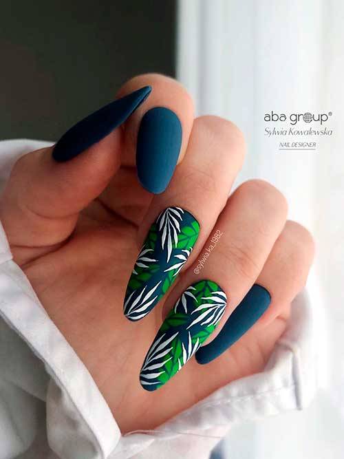 Stylish Belles — Matte Navy Blue Nails with Leaf Nail Art Design...