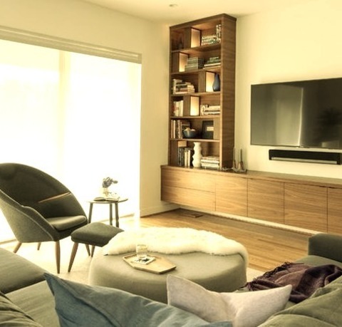 Modern Family RoomFamily Room - Mid-sized Modern Enclosed Medium Tone Wood Floor And Brown Floor Family