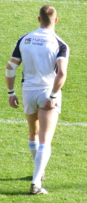 Men in rugby and footy socks