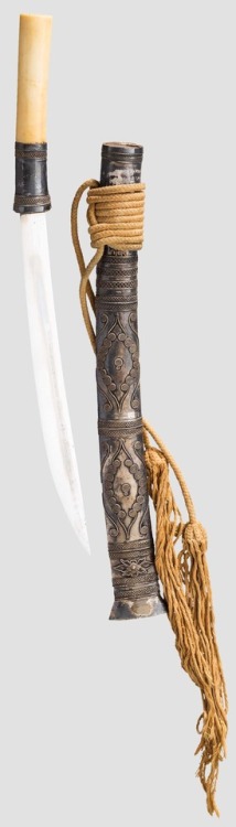Silver mounted Burmese dha with ivory hilt, circa 1900.from Hermann Historica