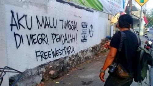 “I’m ashamed of living in an occupying country! Free West Papua”Anarchist graffiti in Solo, Indonesi