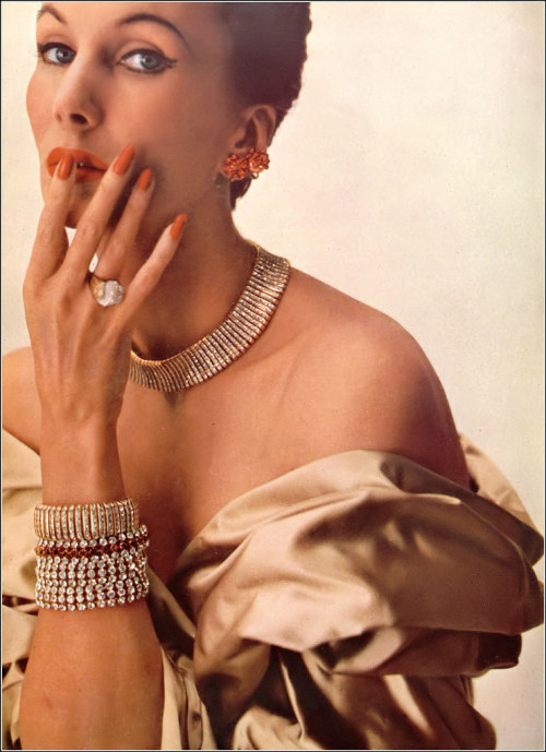 chicinsilk:Barbara Goalen in Jacqmar stole in Duchesse satin and gilt and brilliants for earrings, c