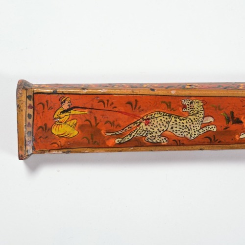 Orange lacquered matchlock toradar musket originating from India, 19th century.from Millea Bros. LTD