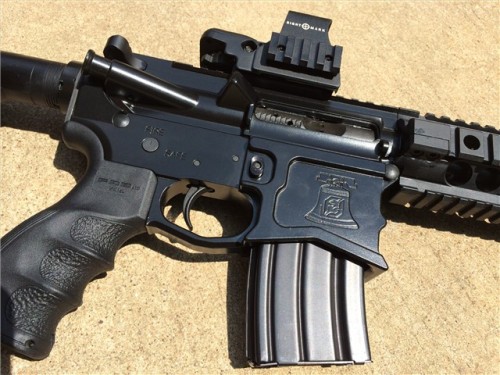 gunrunnerhell:  Beowulf 50 A custom built AR-15 chambered in 50 Beowulf. The factory gas block from Alexander Arms tends to be a bit bulky, making it difficult to conceal under a longer handguard. Interesting but probably more practical choice that the