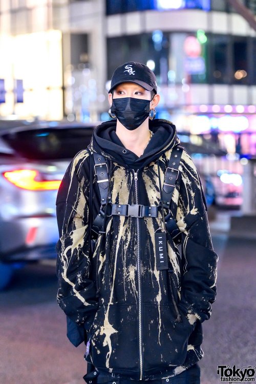 Japanese fashion staffer and freelance model Cham on the street in Harajuku. He&rsquo;s wearing laye