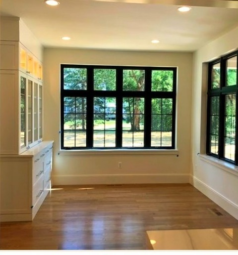 Enclosed - Dining RoomInspiration For A Large Contemporary Light Wood Floor And Brown Floor Enclosed