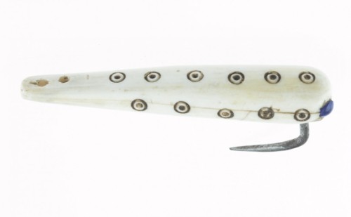 ruralarchaeologist: Fish hookFish hook made of ivory with a metal barb. The hook is shaped like a fi