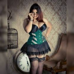 ivydoomkitty:  There aren’t many of this #slytherin print left! Get it via link in bio or http://ivydoomkitty.storenvy.com FREE stickers w/each order!   Corset by @castlecorsetry Photo by @dramaticlight #ivydoomkitty #model #modeling #pinup #pinupgirl
