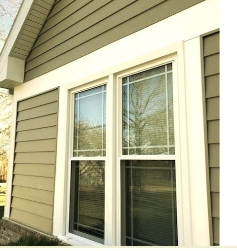 Vinyl - ExteriorInspiration For A Large Timeless Gray One-story Vinyl Exterior Home Remodel With A Shingle