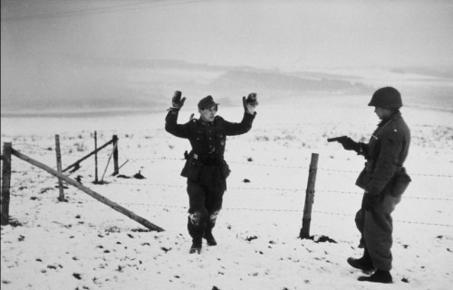 historicaltimes:Wehrmacht soldier surrendering to an American infantryman - Battle of The Bulge, Ard