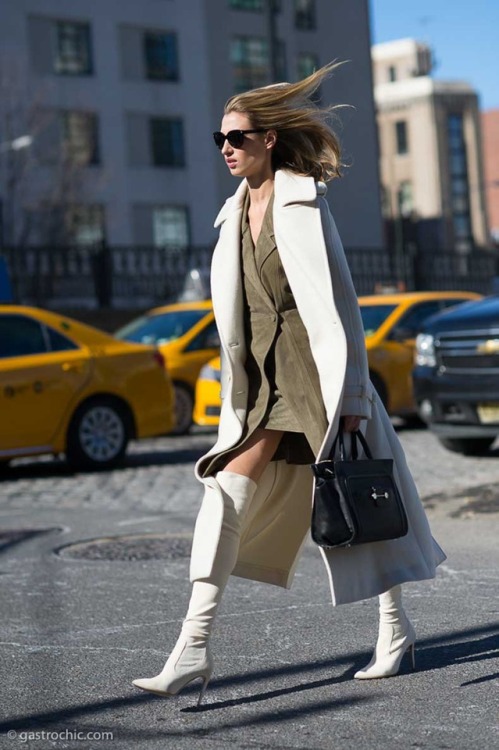 Lauren Remington Platt in her Ralph Lauren Collection cream suede over-the-knee boots at Jason 