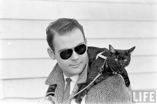 Black cat as fashion accessory(Ralph Crane. 1961)