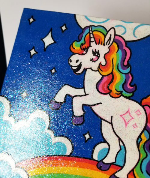  Just finished a cute unicorn posca painting and sealed it with sparkle modge podge, which gave it a