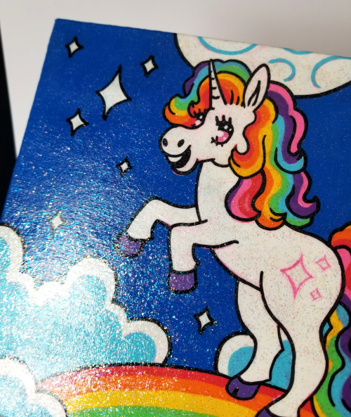 Just finished a cute unicorn posca painting and sealed it with sparkle modge podge, which gave it a 