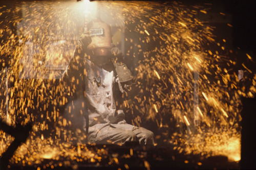 Sparks fly from a welder&rsquo;s torch in China.Photograph by Jodi Cobb, National Geographic