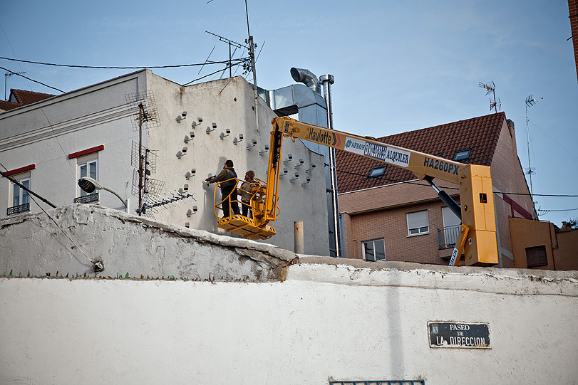 lustik:  CAMERAS, “Installation of 150 fake security cameras on building facade