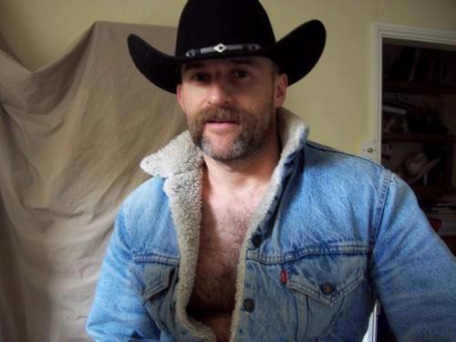This cowboy is one stunningly handsome, hairy, sexy man and with an awesome beard - WOOF
