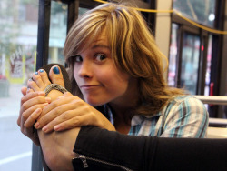 Vandeworld:  Girl In The Bus Showing Her Foot